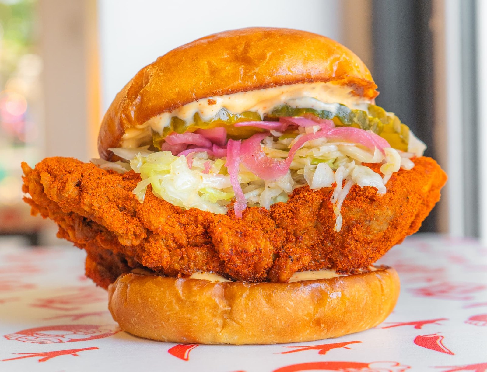 The OG sando with slaw, pickles and pickled onions